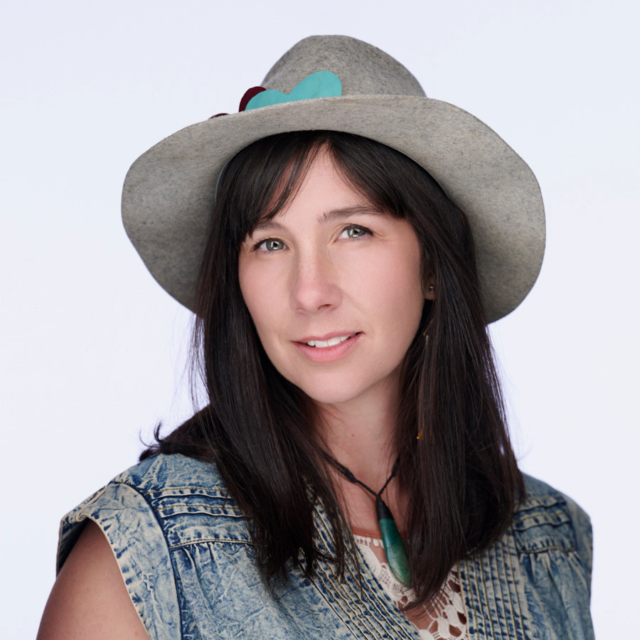 Katrina Lalo Louise in a wide-brimmed hat and denim, close portrait
